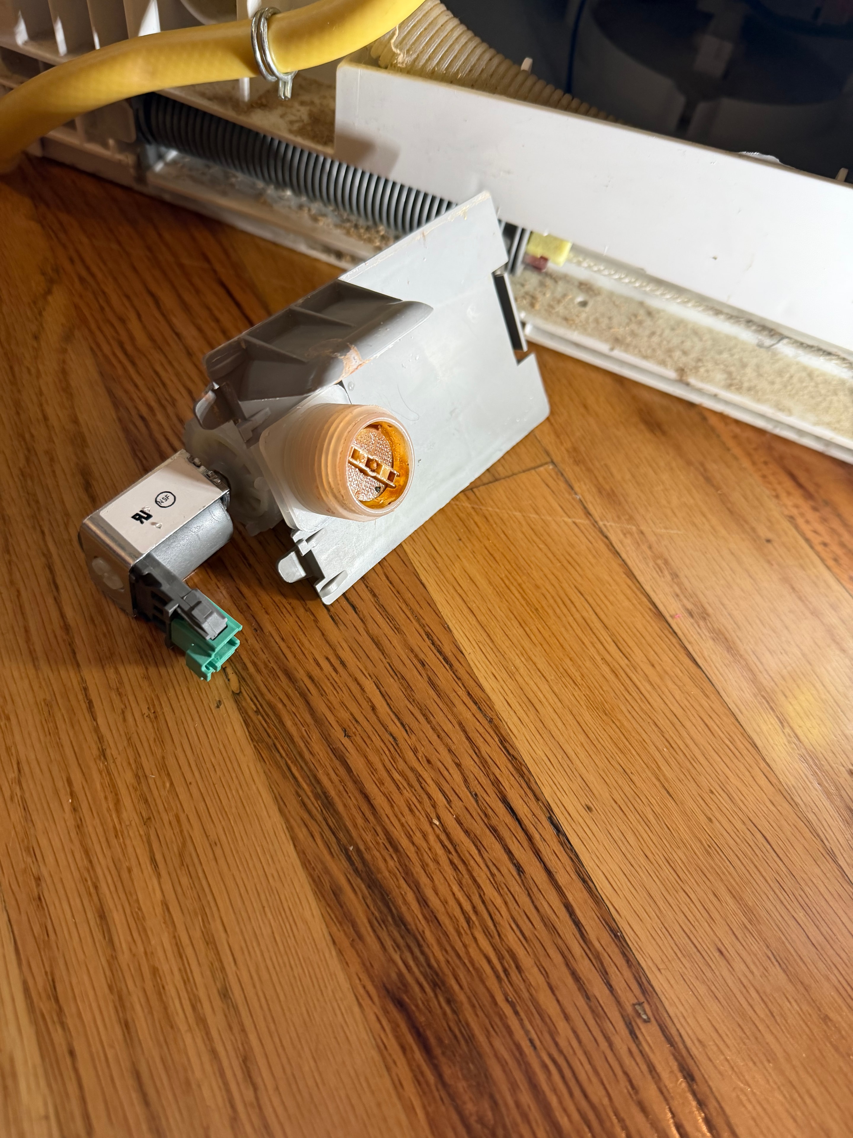 Failed Bosch dishwasher water inlet valve removed — source of E15 leak in Park Hill Denver