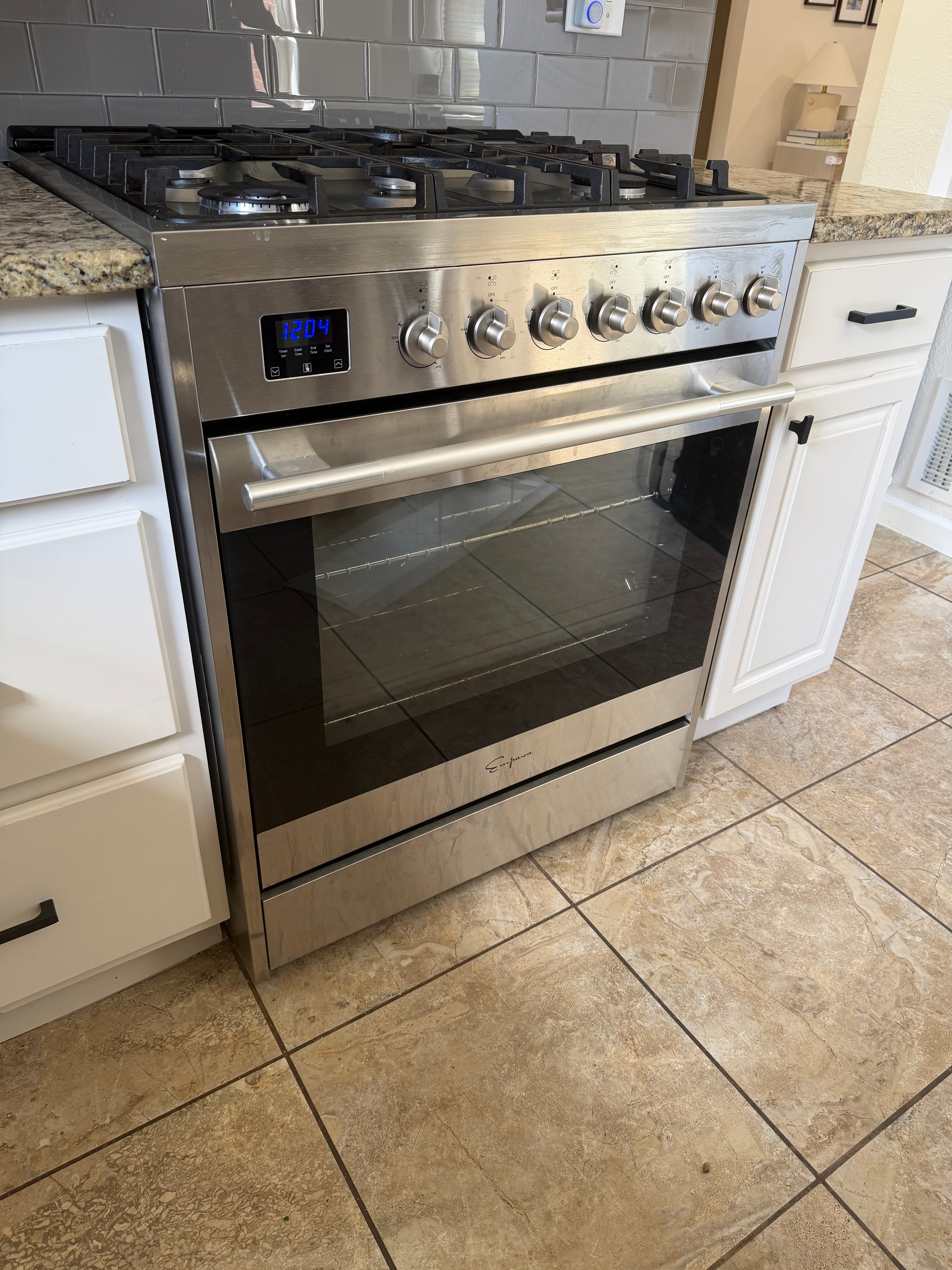 Empava oven igniter mounting bracket and burner assembly during repair — Park Hill Denver