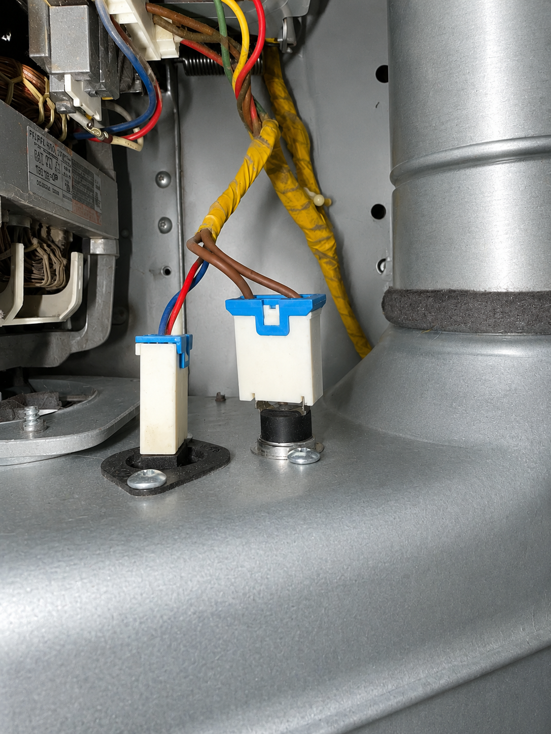 Failed thermal fuse WP35001087 on Kenmore dryer blower housing — Highlands, Denver